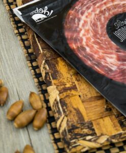Jamón de Bellota 100% Ibérico. Sobre 100 g. mg 1038