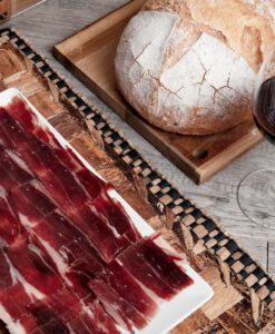 Paleta de bellota 100% ibérica. Cortada a cuchillo. plato paleta a cuchillo